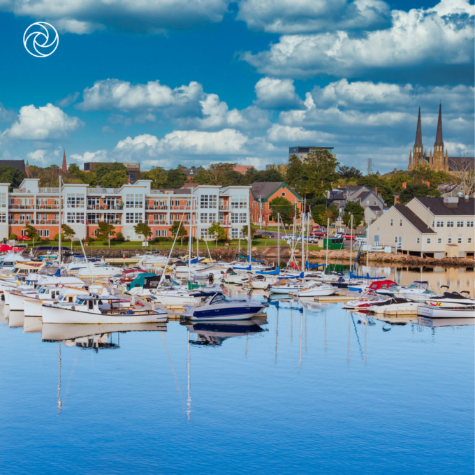 Marina filled with sailboats and recreational boats along the Charlottetown waterfront on a sunny day.